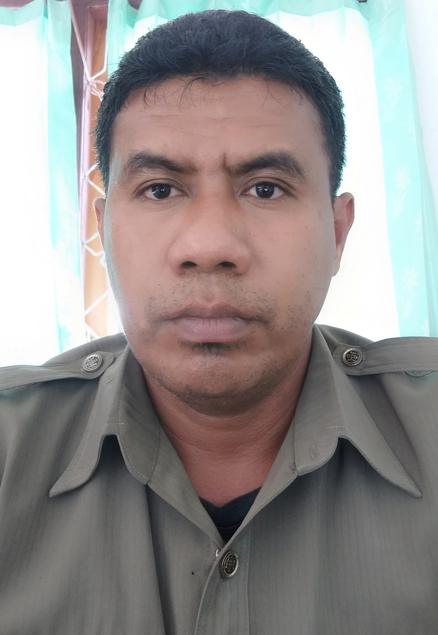 Wilhelmus H. E. Hugu Ruron, S.kom